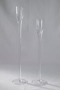 LOT DE DEUX BOUGEOIRS EN VERRE