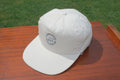 CASQUETTE GRAPHIQUE BLANC CASSÉ