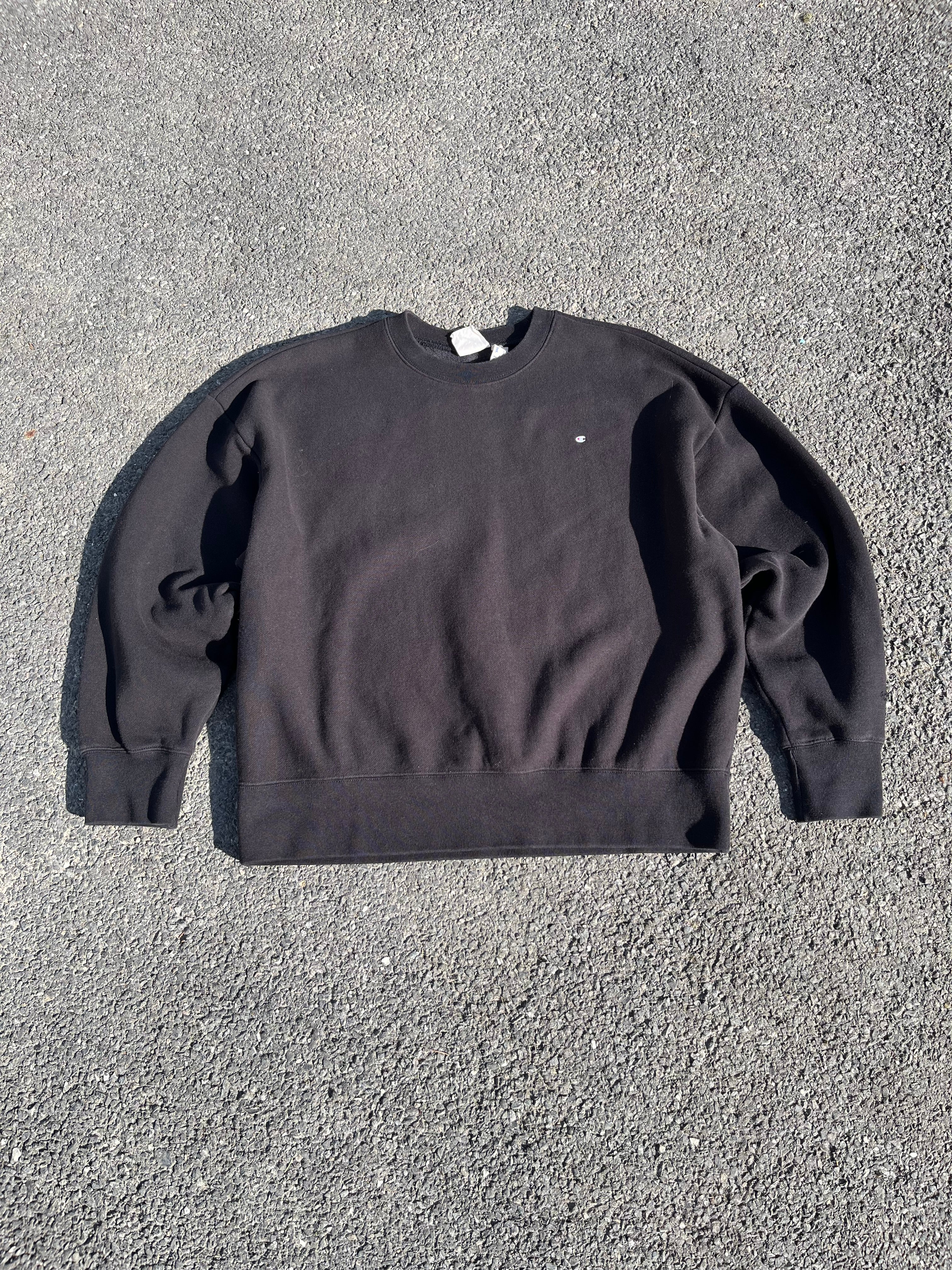 SWEAT CHAMPION NOIR AVEC MINI LOGO