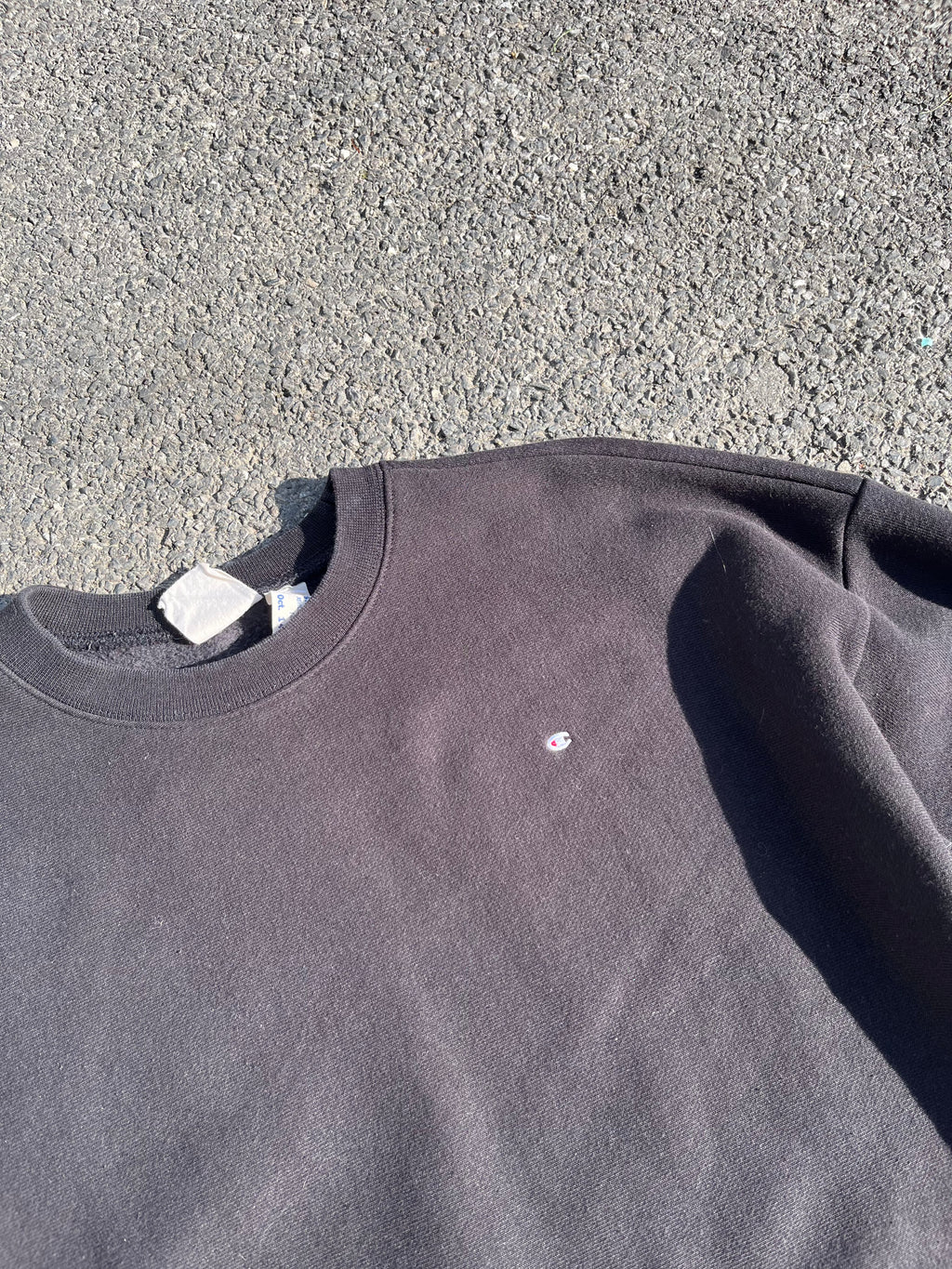 SWEAT CHAMPION NOIR AVEC MINI LOGO
