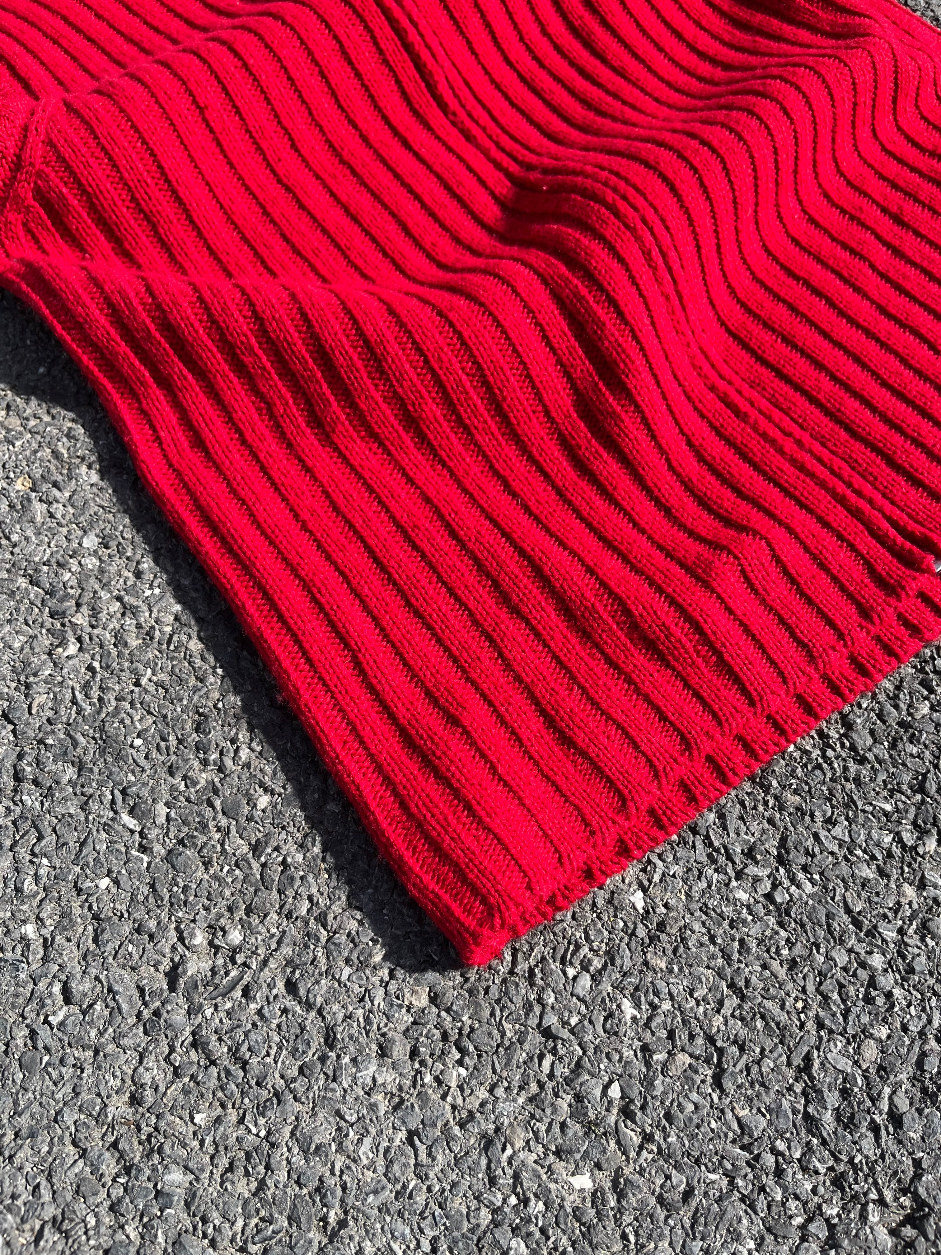 VESTE BENETTON SANS MANCHE ROUGE
