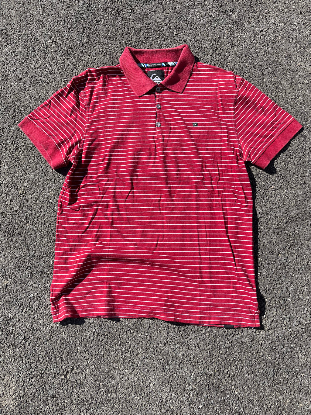POLO QUIKSILVER RAYÉ ROUGE ET BLANC