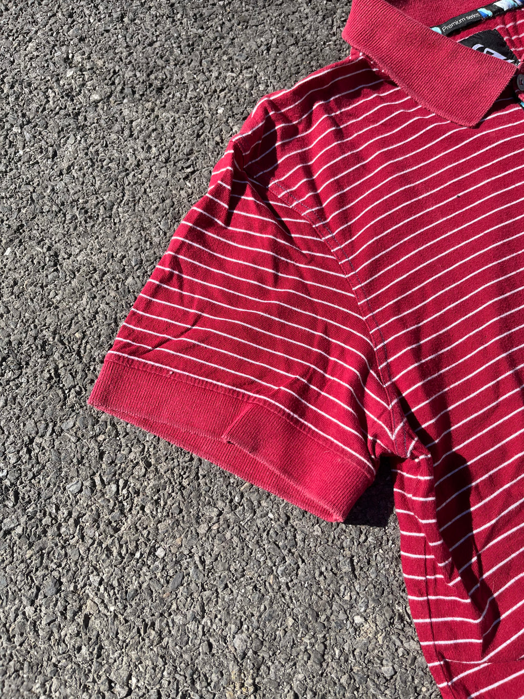 POLO QUIKSILVER RAYÉ ROUGE ET BLANC