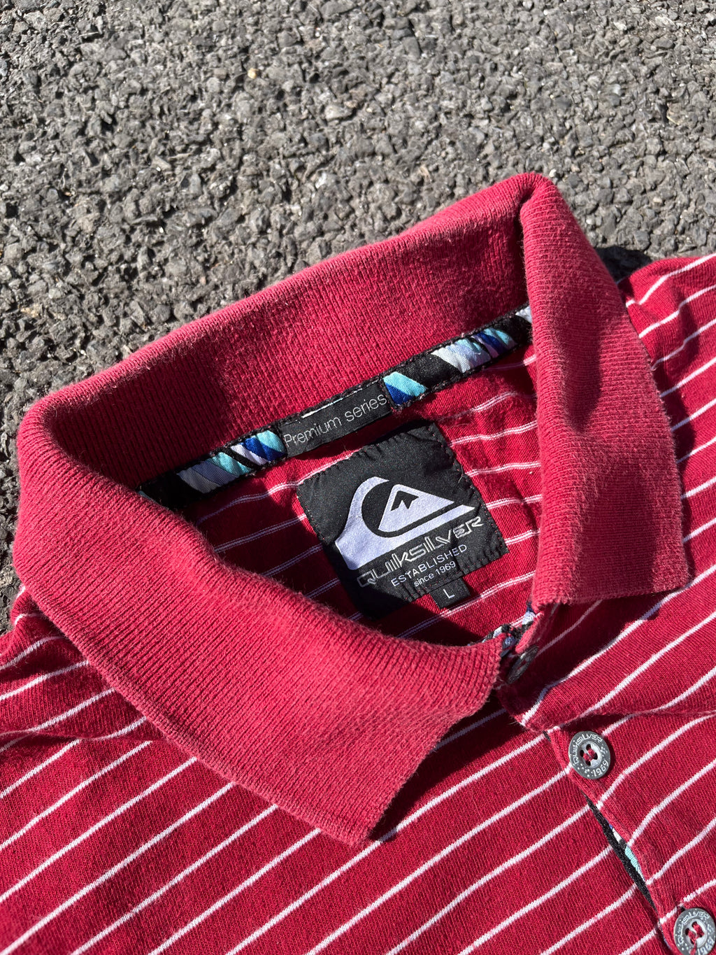 POLO QUIKSILVER RAYÉ ROUGE ET BLANC