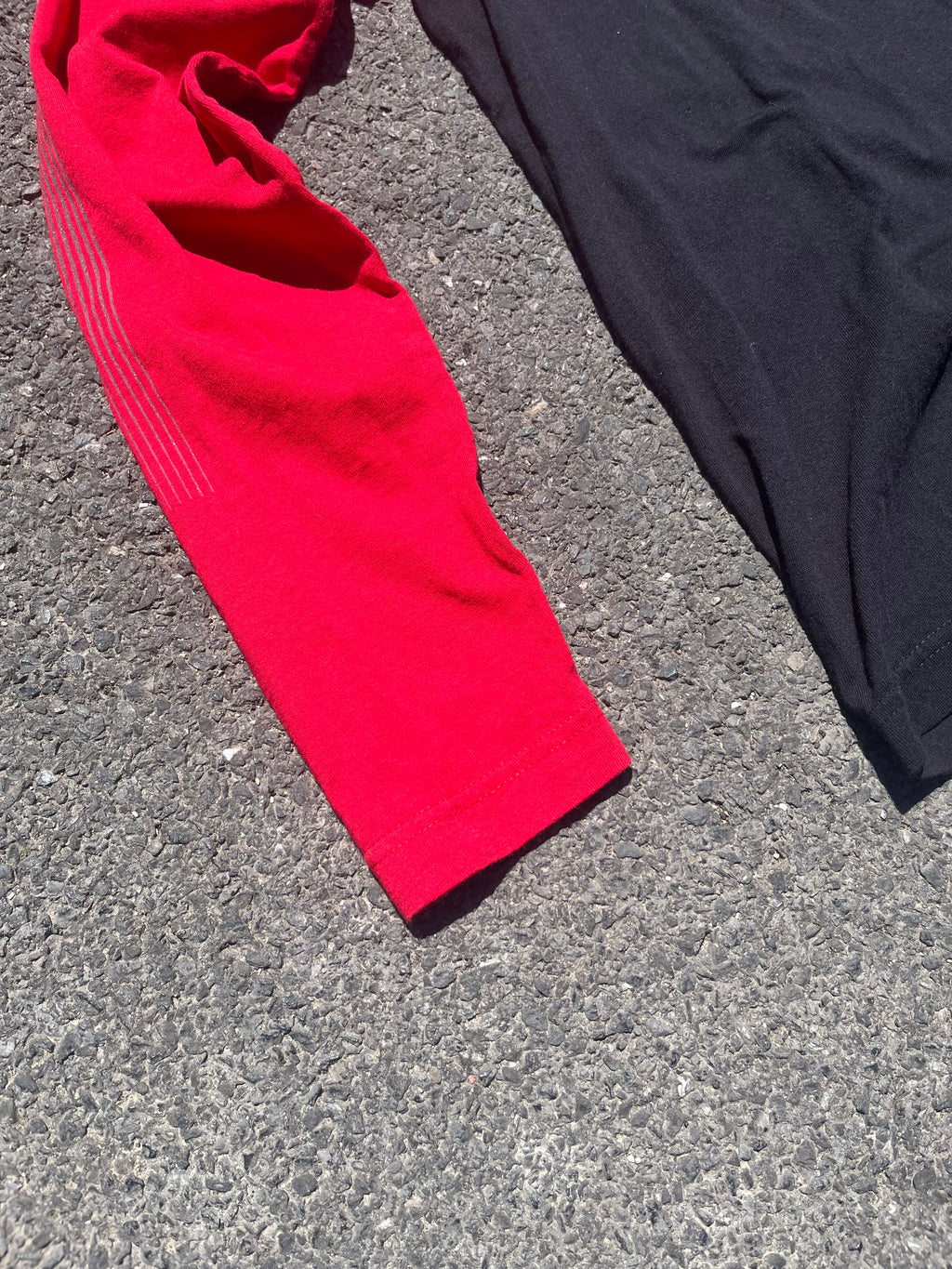 MANCHE LONGUE ONEIL NOIR ET ROUGE