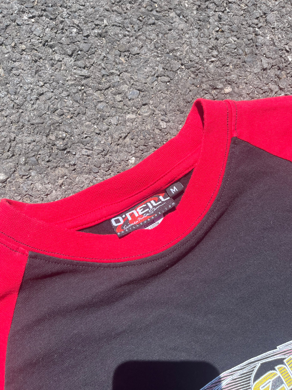 MANCHE LONGUE ONEIL NOIR ET ROUGE