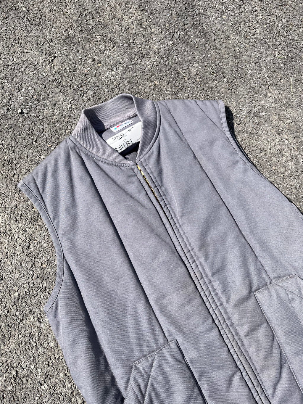 VESTE DE TRAVAILLE SANS MANCHE GRISE
