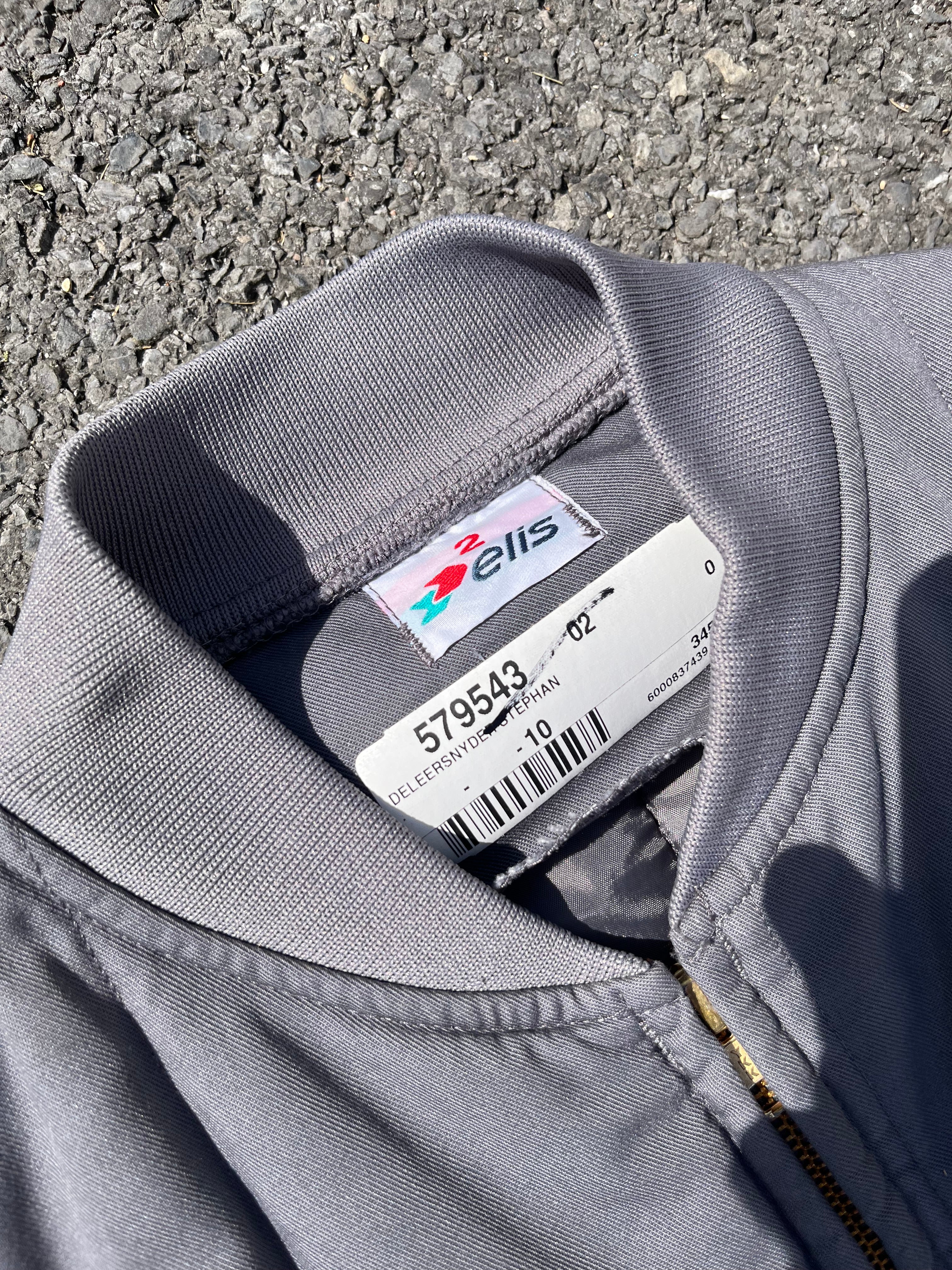 VESTE DE TRAVAILLE SANS MANCHE GRISE